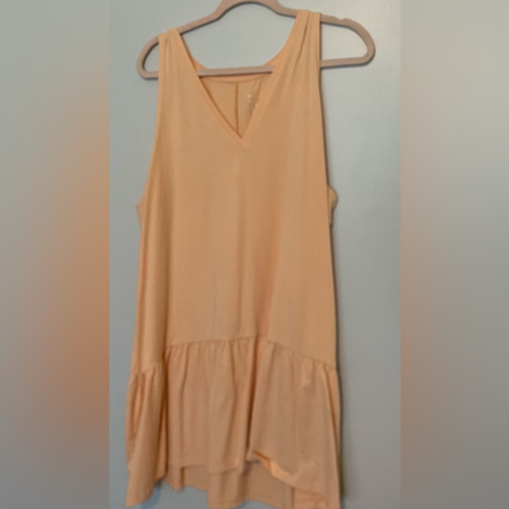 Peachy/orange mini dress with ruffle detail